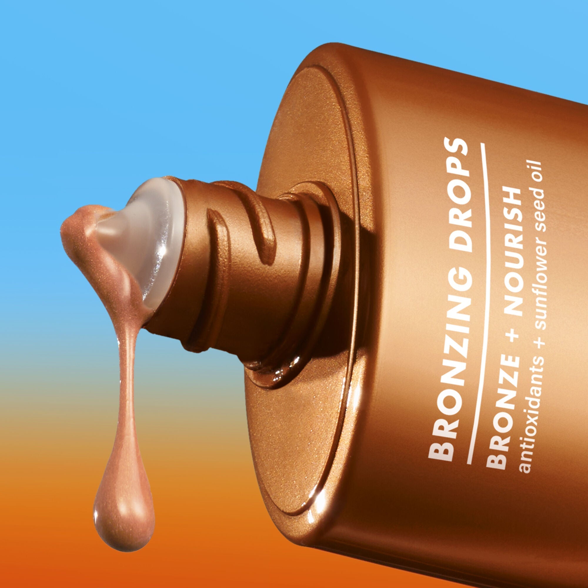 Bronzing drops bottle with droplet on gradient blue/orange background