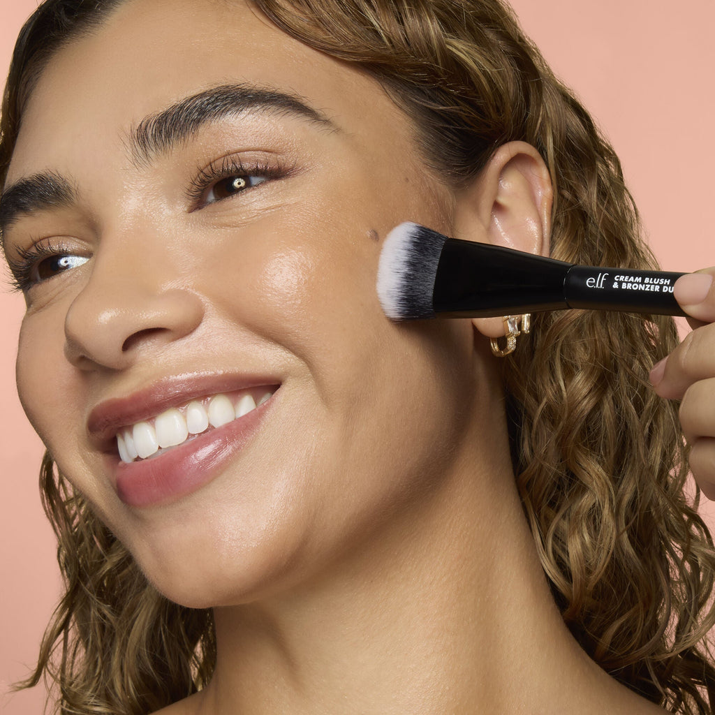 Model Applying Makeup Using the Cream Blush and Bronzer Duo Makeup Brush