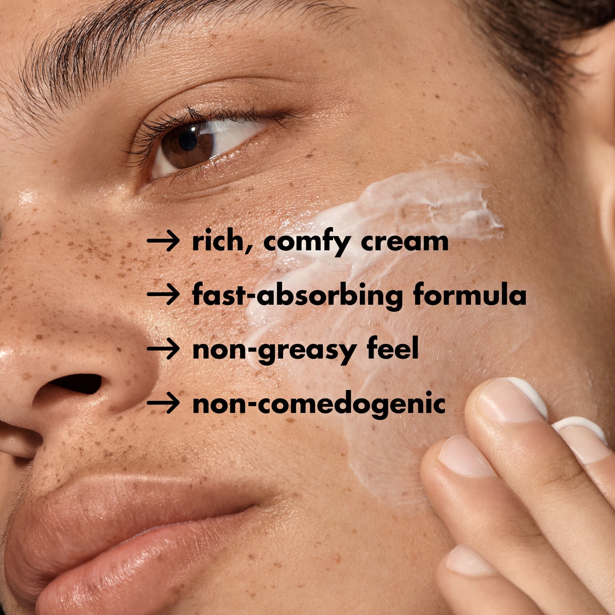 Person applying face cream - won't clog pores.